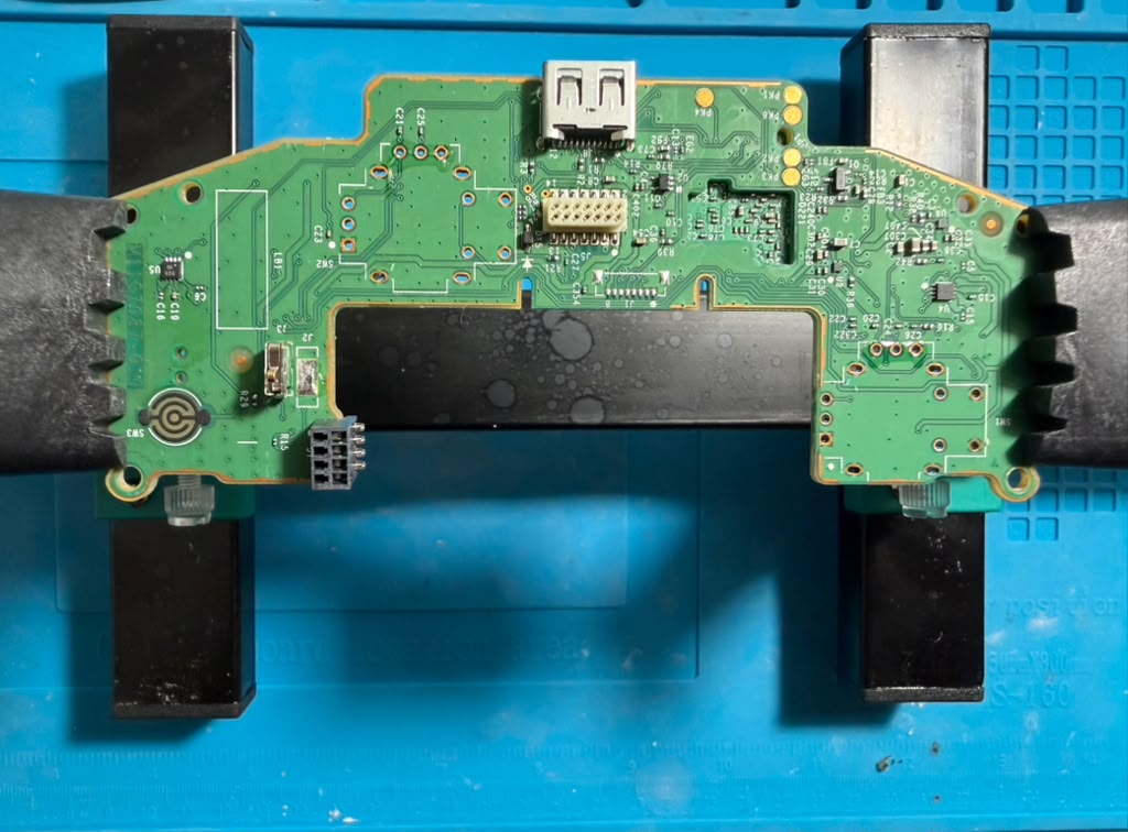 Xbox controller PCB after desoldering defective modules